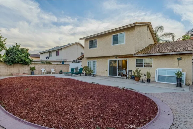 front view of a house with a patio
