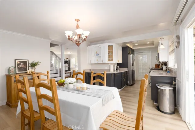 a view of a living room and kitchen view