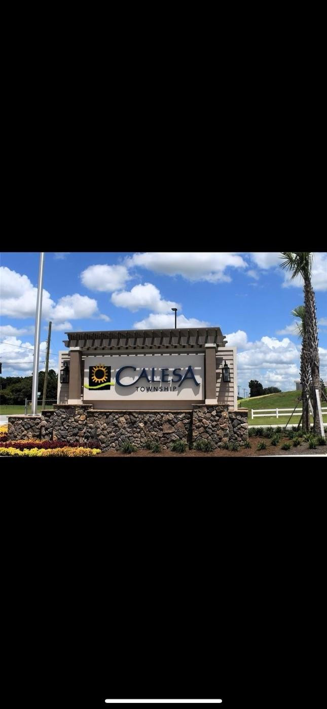 7628 Southwest 63rd Lane Road Ocala, FL 34474 - Photo 15 of 25 a view of a city with sunset