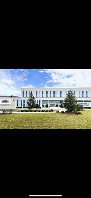 7628 Southwest 63rd Lane Road Ocala, FL 34474 - Photo 17 of 25 a view of building with outdoor space and street view