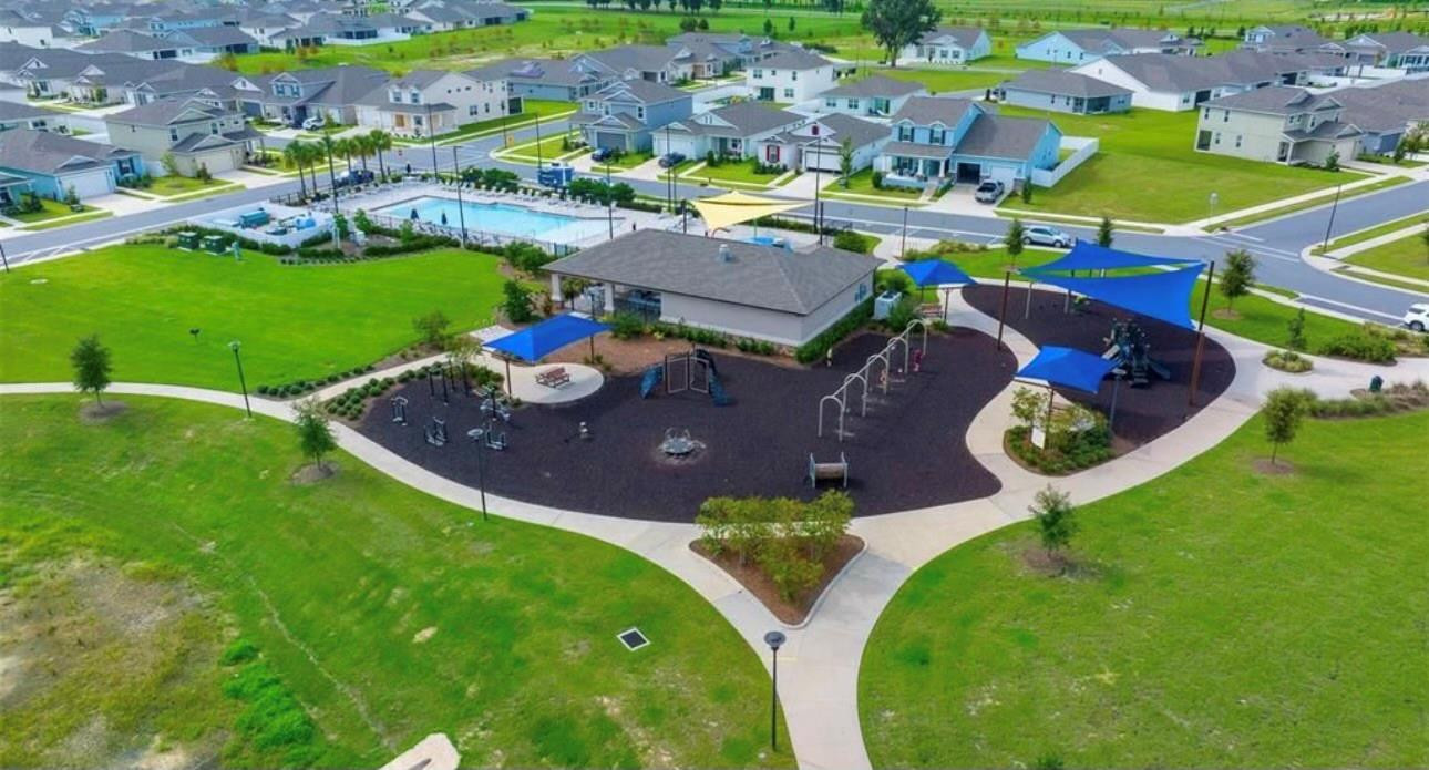 7628 Southwest 63rd Lane Road Ocala, FL 34474 - Photo 22 of 25 an aerial view of a house with garden space and outdoor space