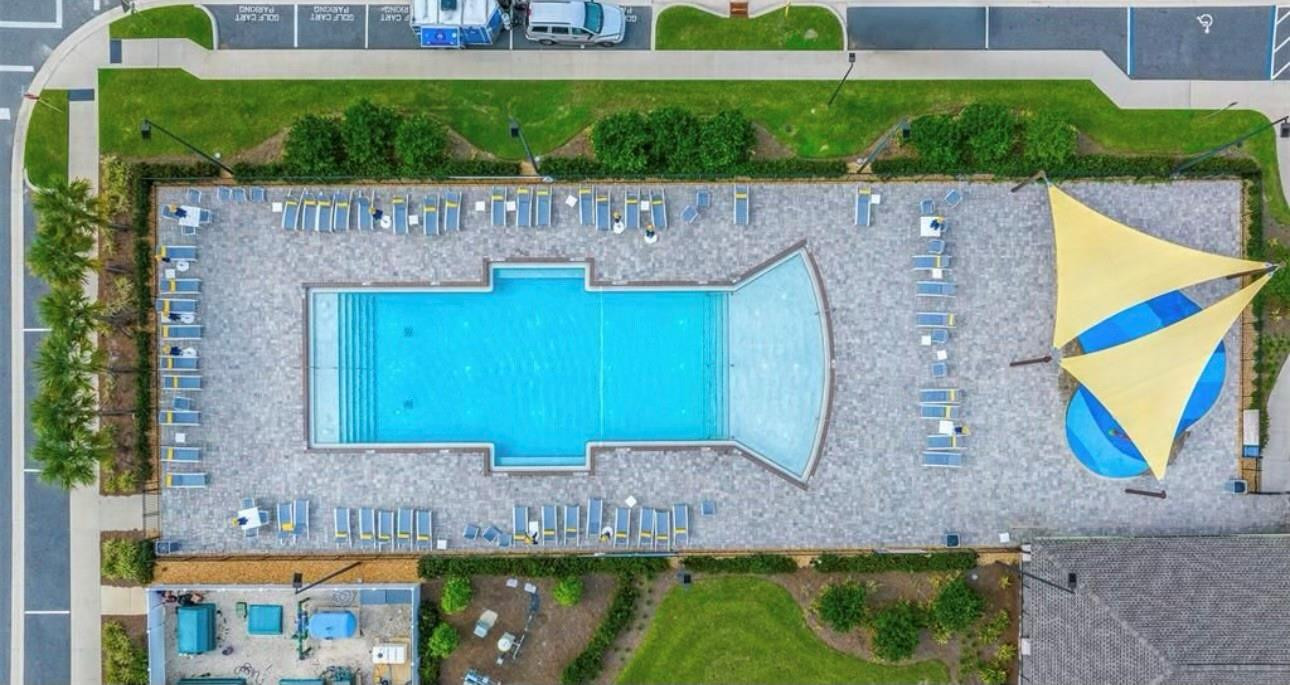 7628 Southwest 63rd Lane Road Ocala, FL 34474 - Photo 23 of 25 an aerial view of a house with a swimming pool