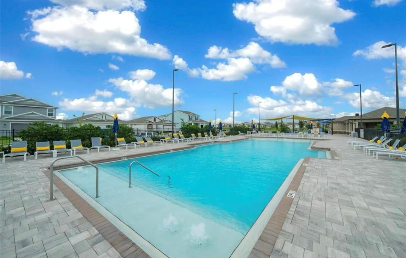 7628 Southwest 63rd Lane Road Ocala, FL 34474 - Photo 25 of 25 a view of a lake and a yard