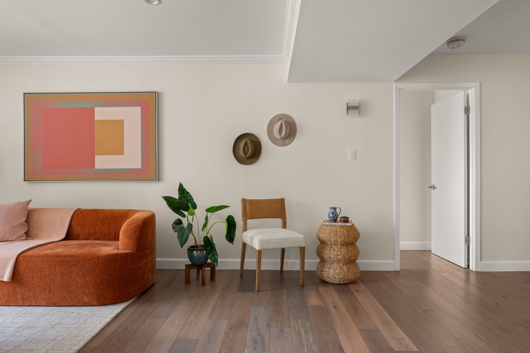 40 North Interstate Highway 35, Unit 11B2 Austin, TX 78701 - Photo 3 of 28 Rich hardwood floors complement light walls, creating a welcoming living area.