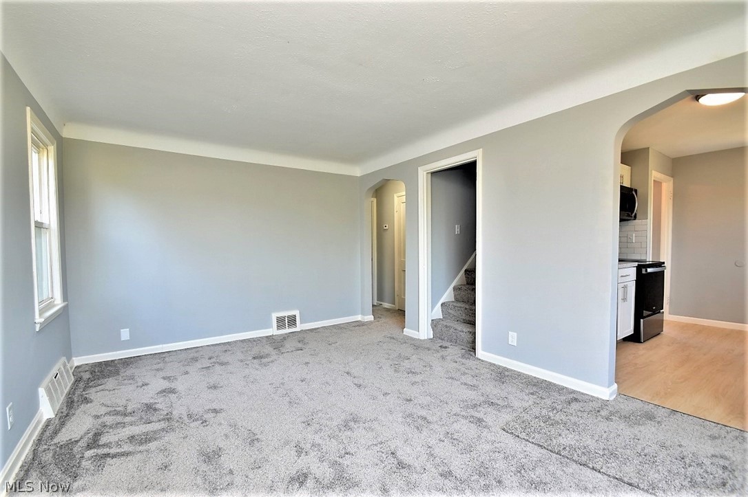 20500 Hansen Road Maple Heights, OH 44137 - Photo 11 of 30 Living room looking back from the front window