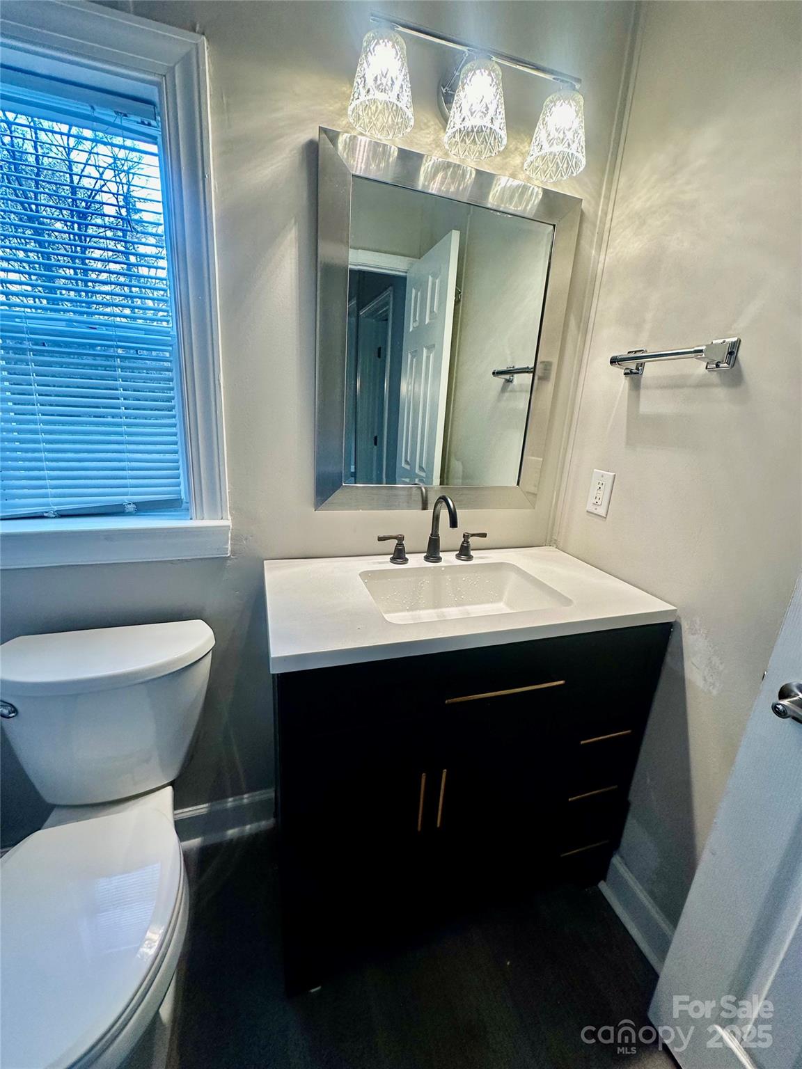 980 Olde Creek Trail Concord, NC 28025 - Photo 21 of 26 a bathroom with a sink and a mirror
