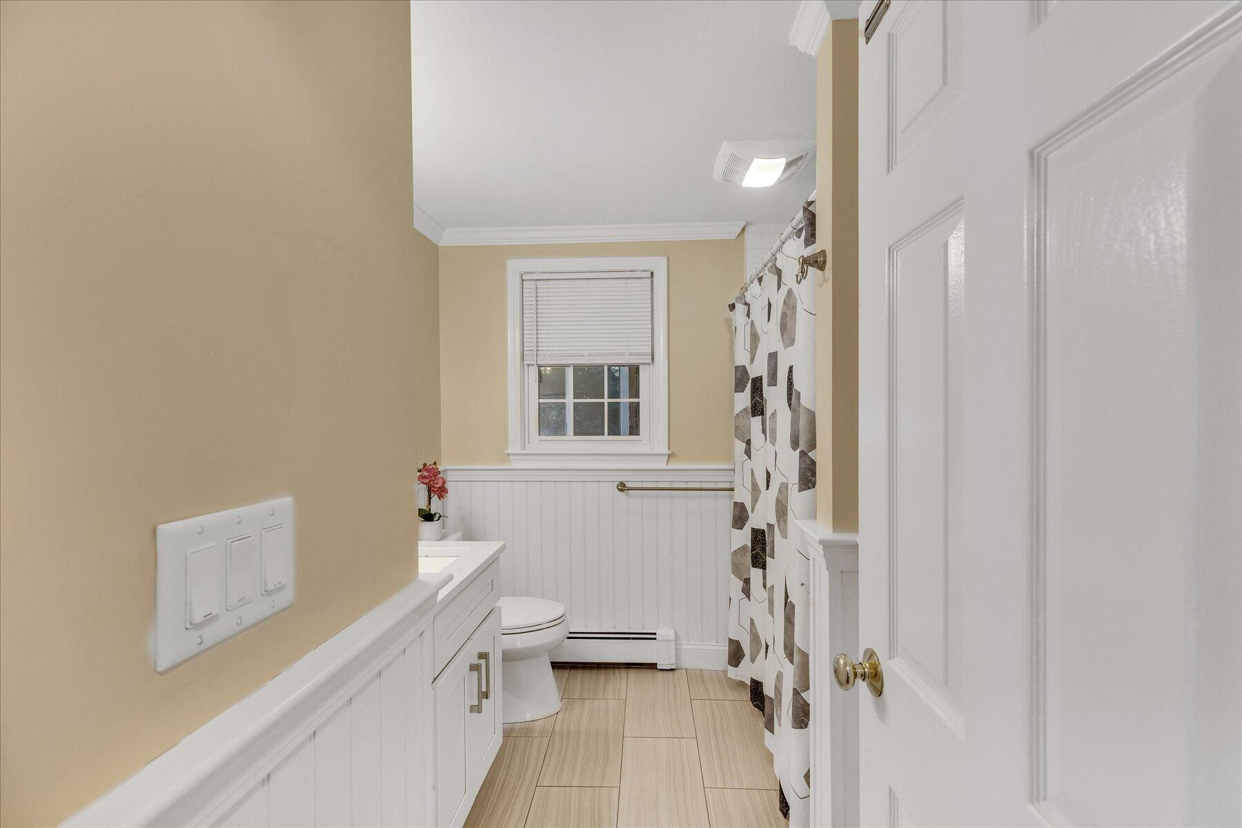 53 Deer Ridge Road Mashpee, MA 02649 - Photo 23 of 50 a bathroom with a sink a toilet and shower