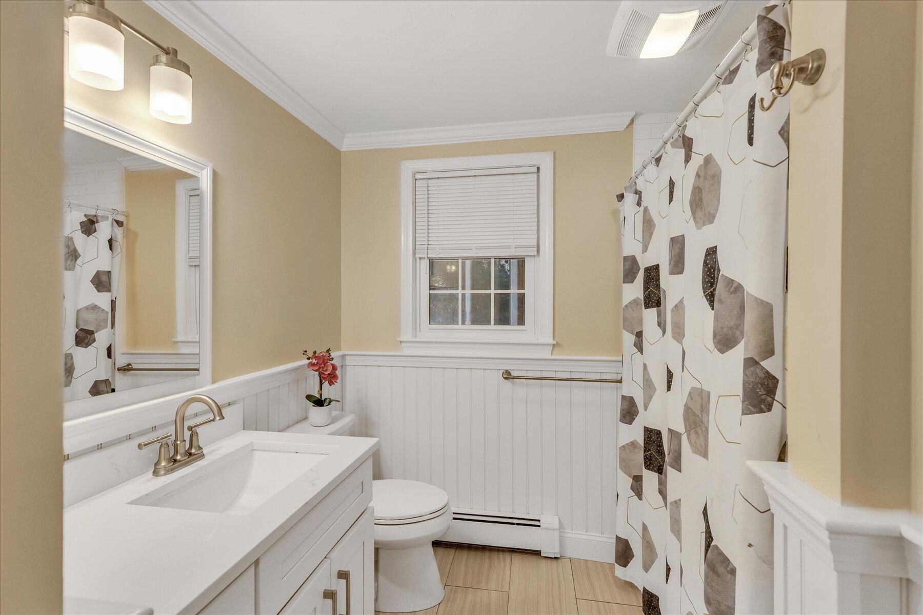 53 Deer Ridge Road Mashpee, MA 02649 - Photo 24 of 50 a bathroom with a sink toilet and shower