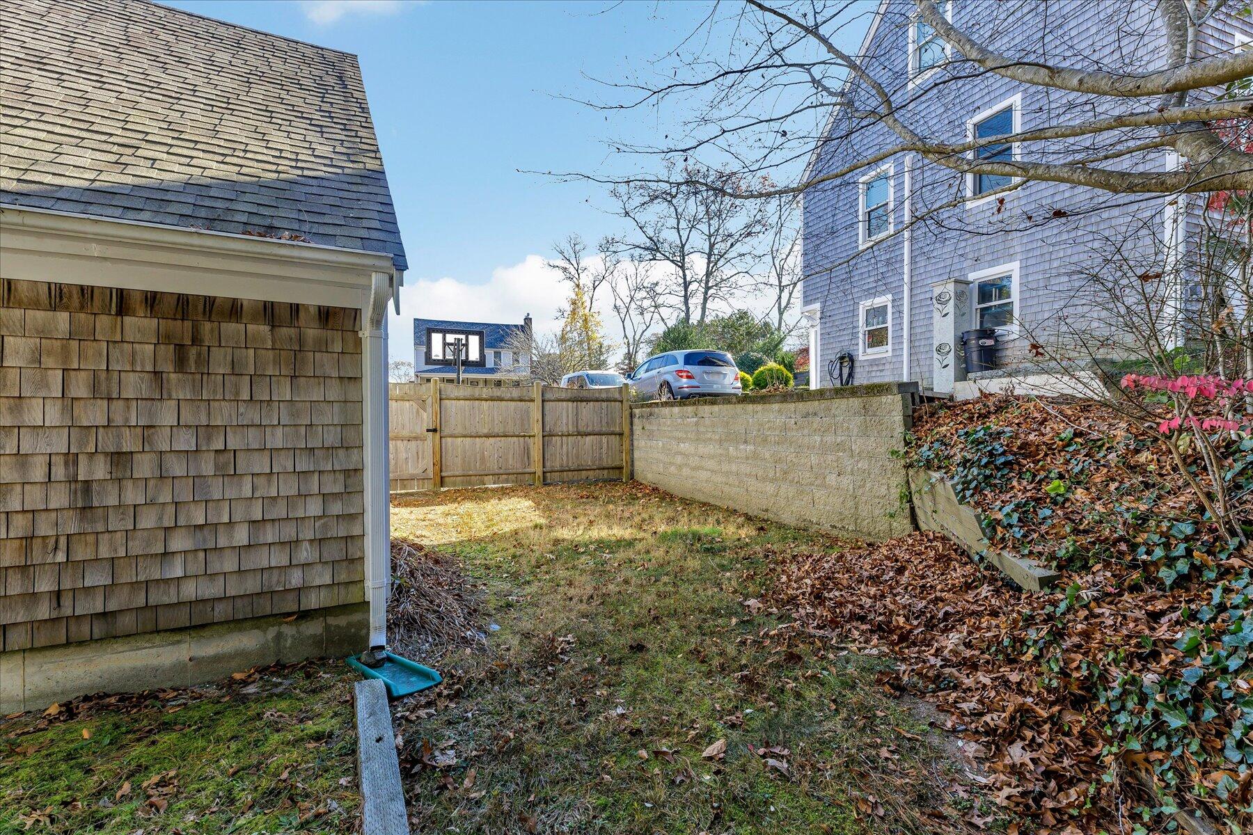 53 Deer Ridge Road Mashpee, MA 02649 - Photo 47 of 50 a view of a backyard