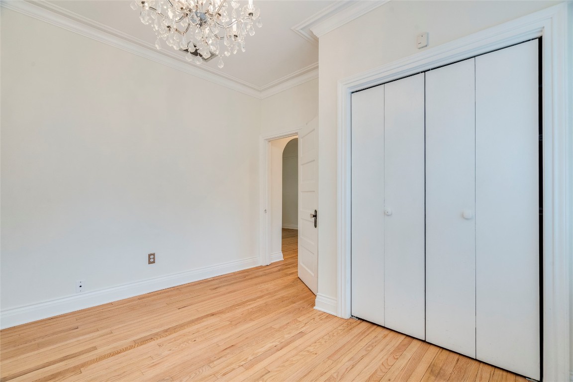 512 East 49th Street, Unit A Austin, TX 78751 - Photo 16 of 31 a view of a hallway with wooden floor