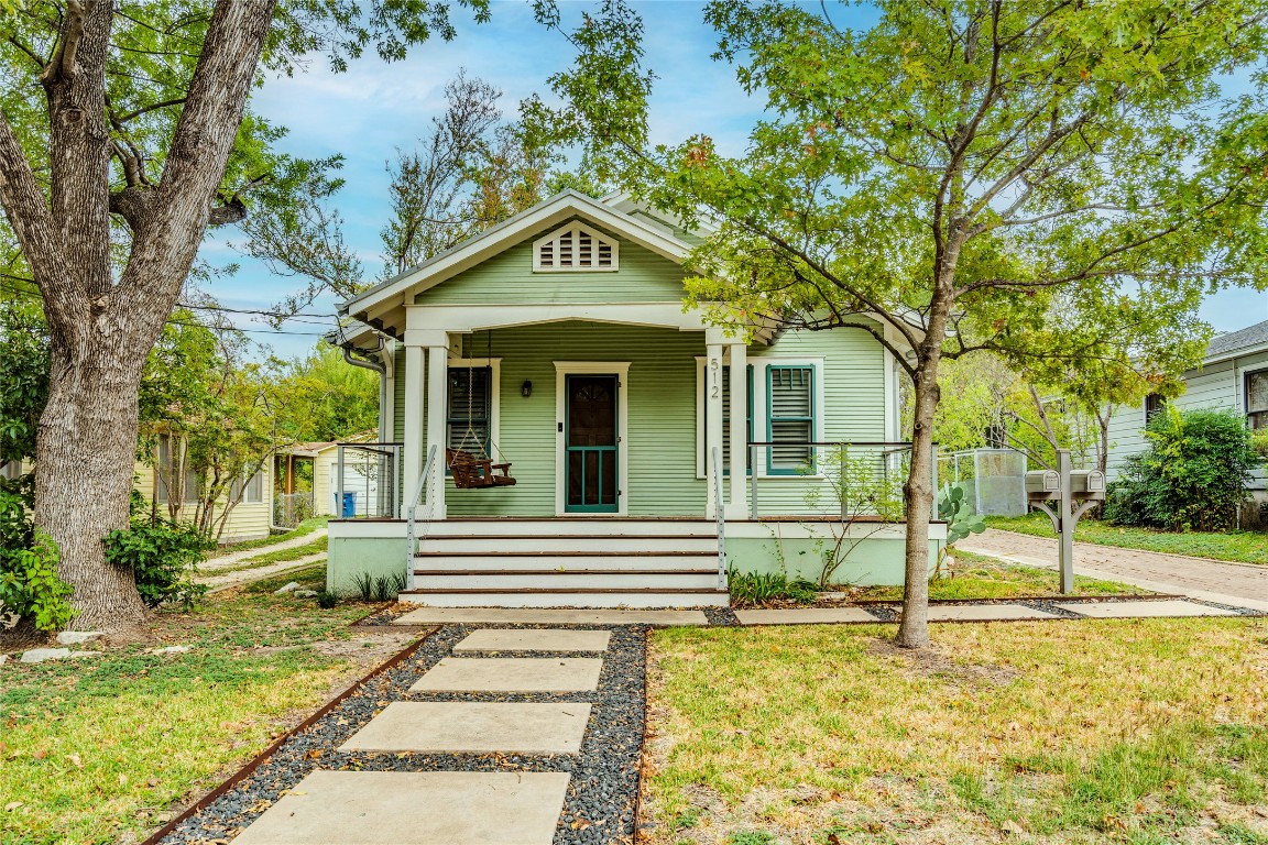 512 East 49th Street, Unit A Austin, TX 78751 - Photo 24 of 31 a front view of a house with a yard
