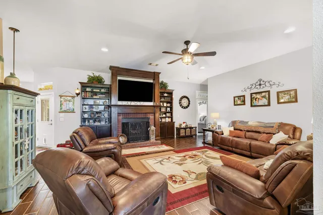 a bedroom with furniture and a chandelier