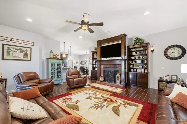 a large kitchen with a table and chairs