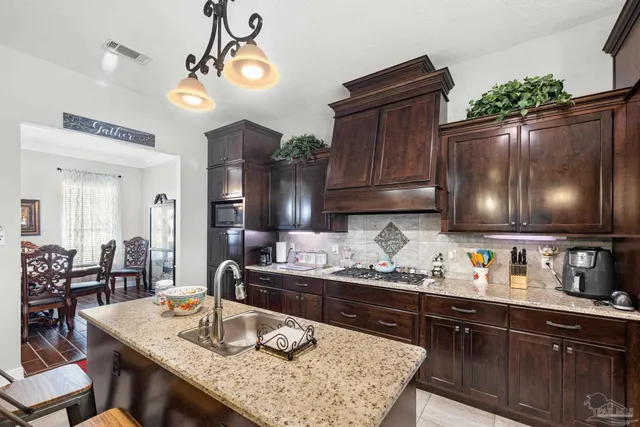 a bedroom with a bed and dresser