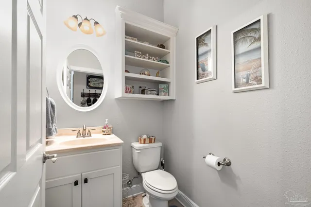 a en suite bathroom with a sink and a mirror