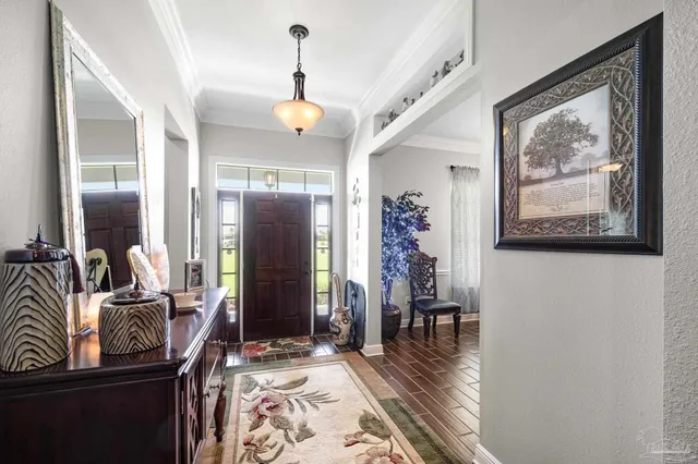 a bathroom with a granite countertop toilet sink and a mirror