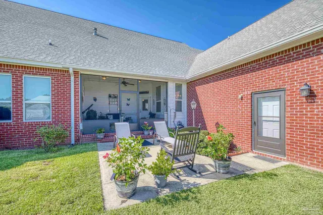 front view of a house with a swimming pool