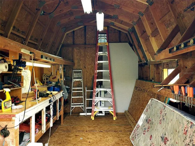 a view of living room with stairs and furniture