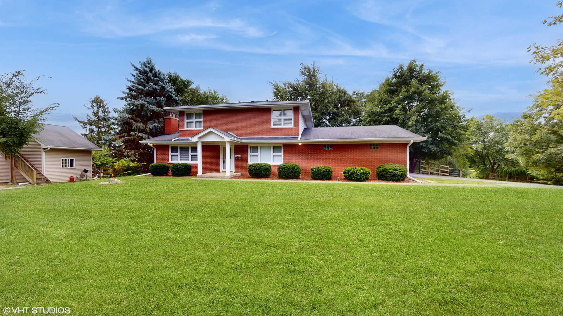 41W965 Empire Road St. Charles, IL 60175 - Photo 1 of 44 a view of a house with a yard