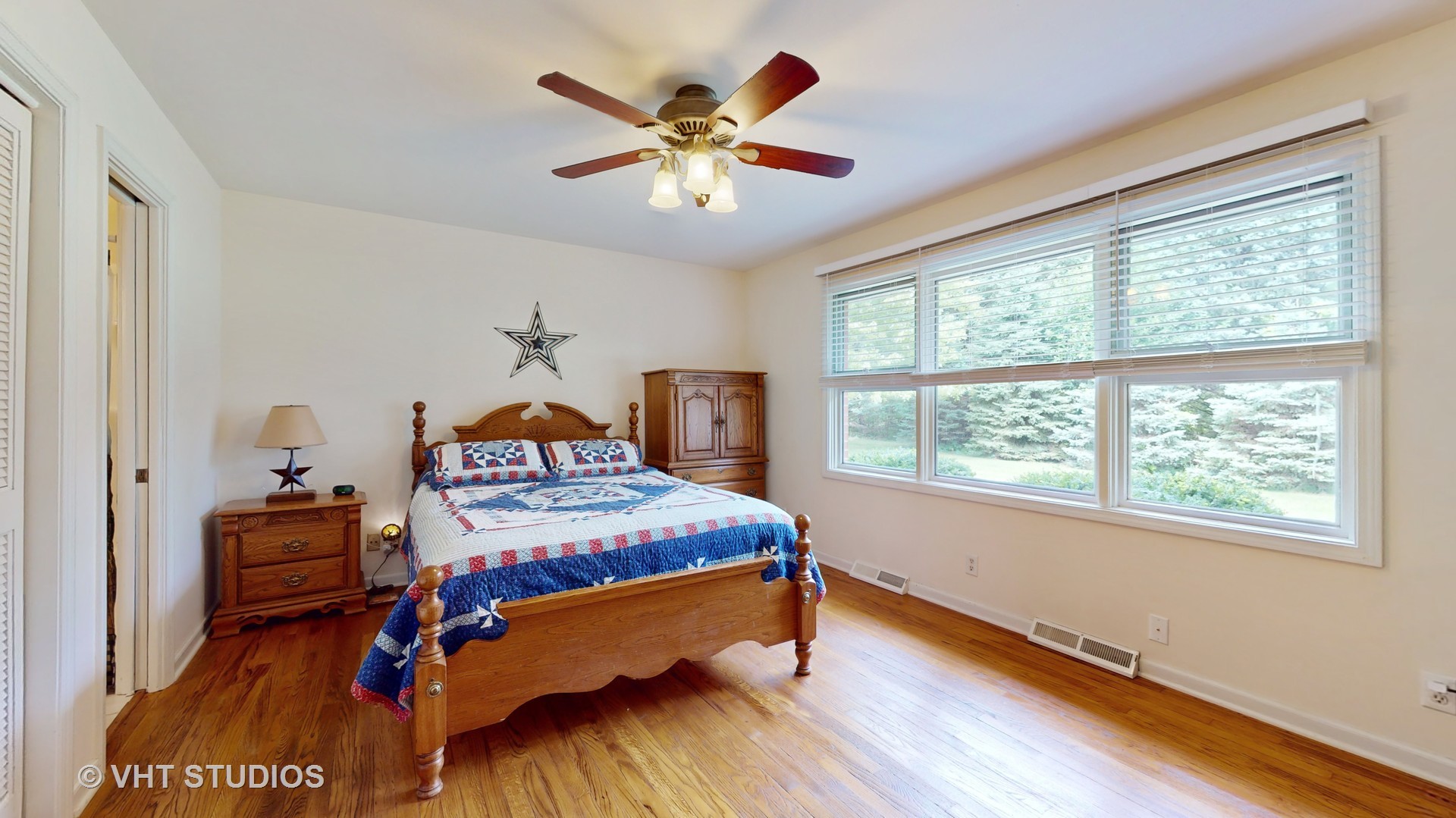 41W965 Empire Road St. Charles, IL 60175 - Photo 13 of 44 a bedroom with a bed and wooden floor