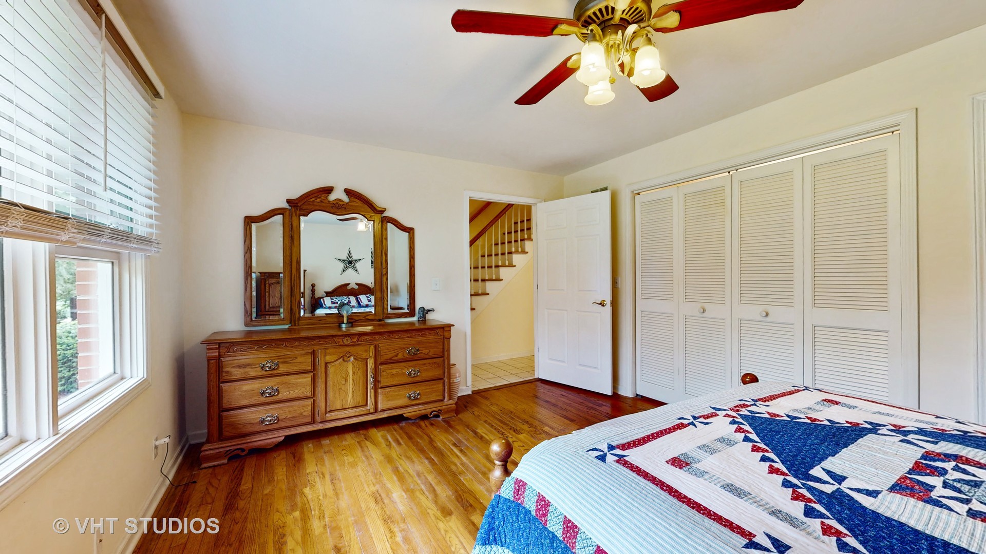41W965 Empire Road St. Charles, IL 60175 - Photo 14 of 44 a bedroom with a bed and a chandelier
