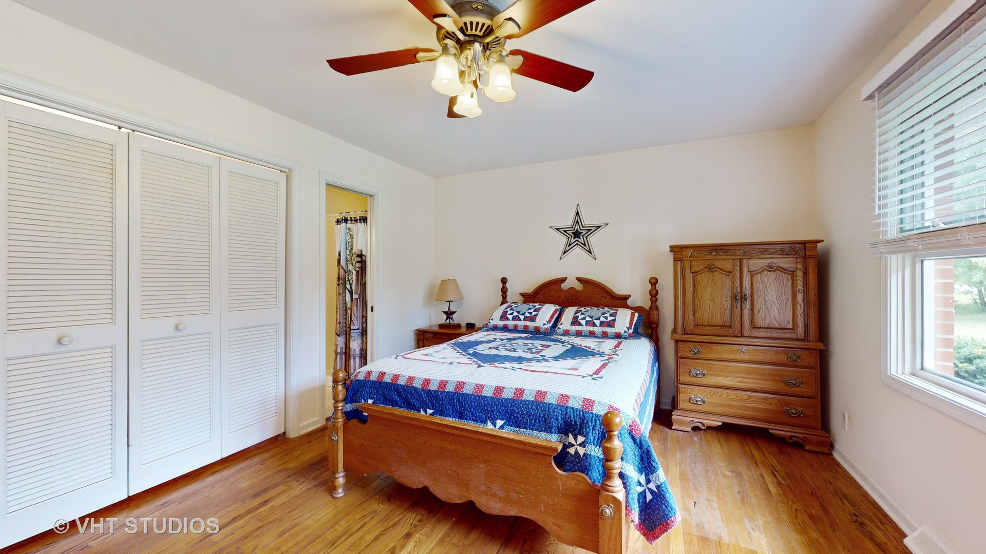 41W965 Empire Road St. Charles, IL 60175 - Photo 15 of 44 a bedroom with a bed and a chandelier