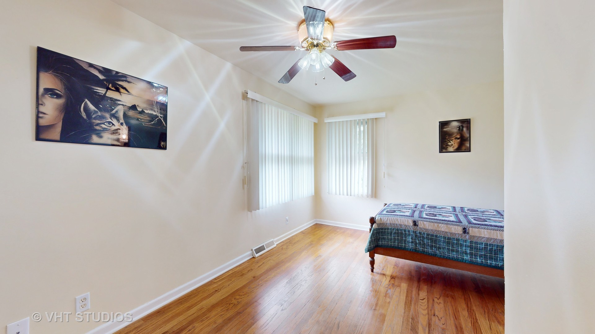 41W965 Empire Road St. Charles, IL 60175 - Photo 21 of 44 a bedroom with a bed and a painting on the wall