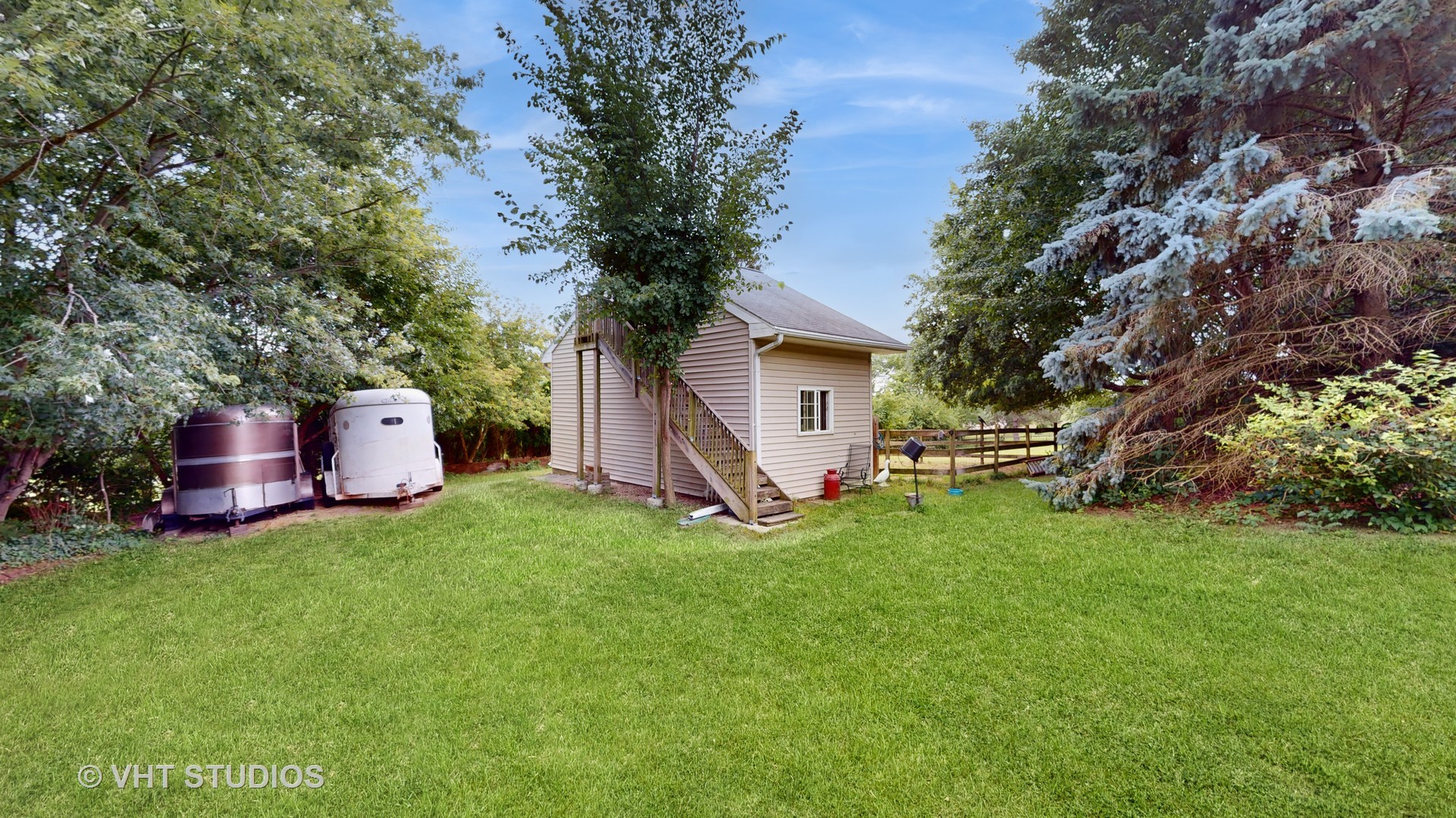 41W965 Empire Road St. Charles, IL 60175 - Photo 40 of 44 a view of backyard with a barn and large trees