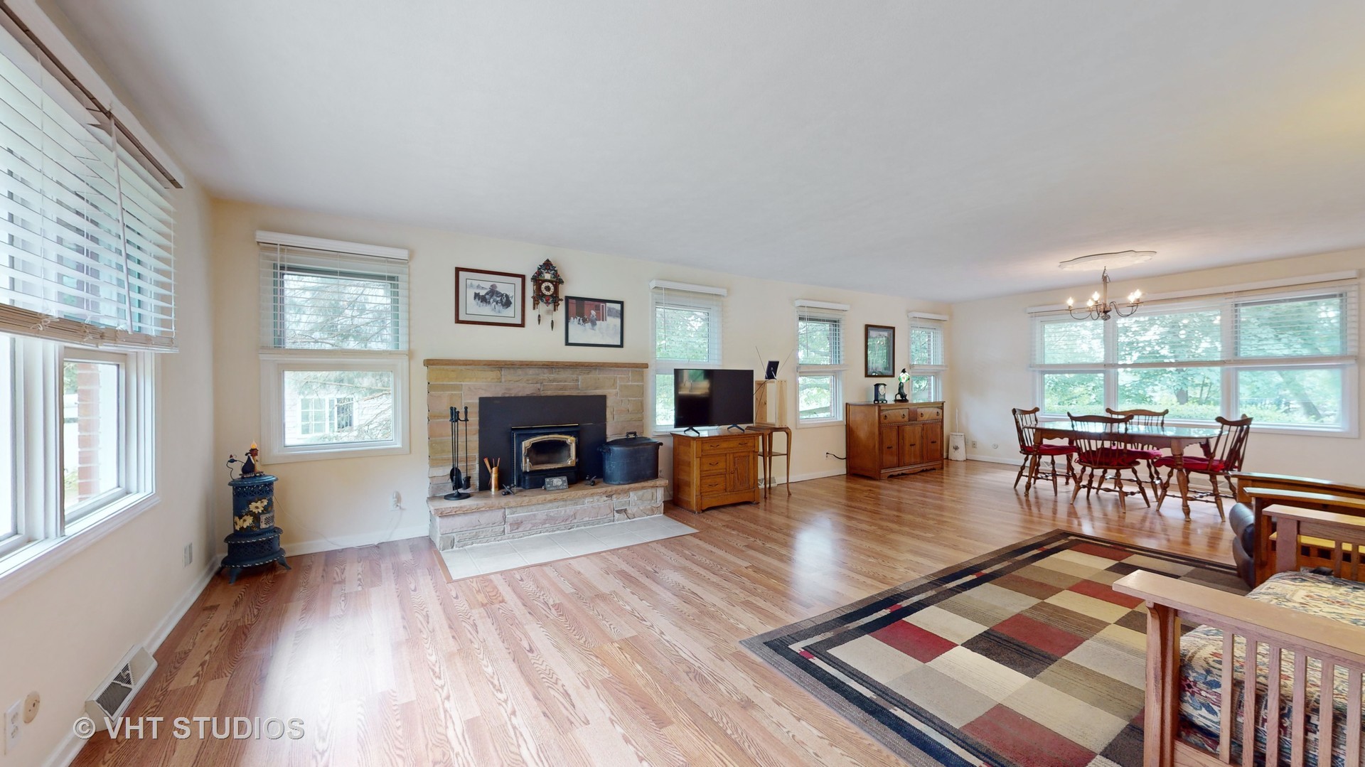 41W965 Empire Road St. Charles, IL 60175 - Photo 6 of 44 a living room with furniture large window and fireplace