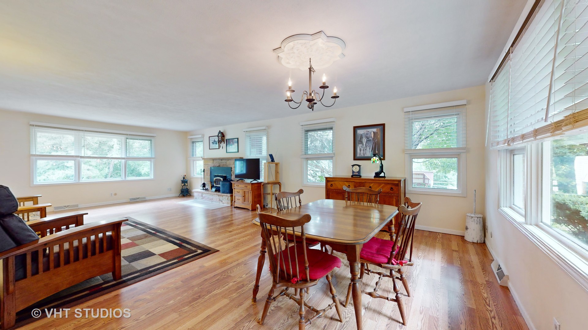 41W965 Empire Road St. Charles, IL 60175 - Photo 9 of 44 a view of a dining room with furniture window and wooden floor