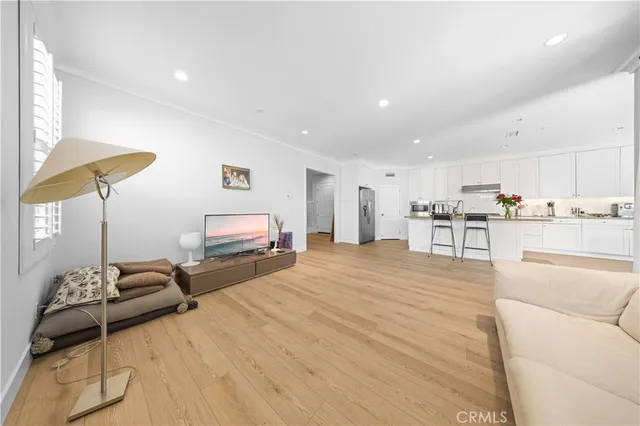 a bed room with a bed and a chair