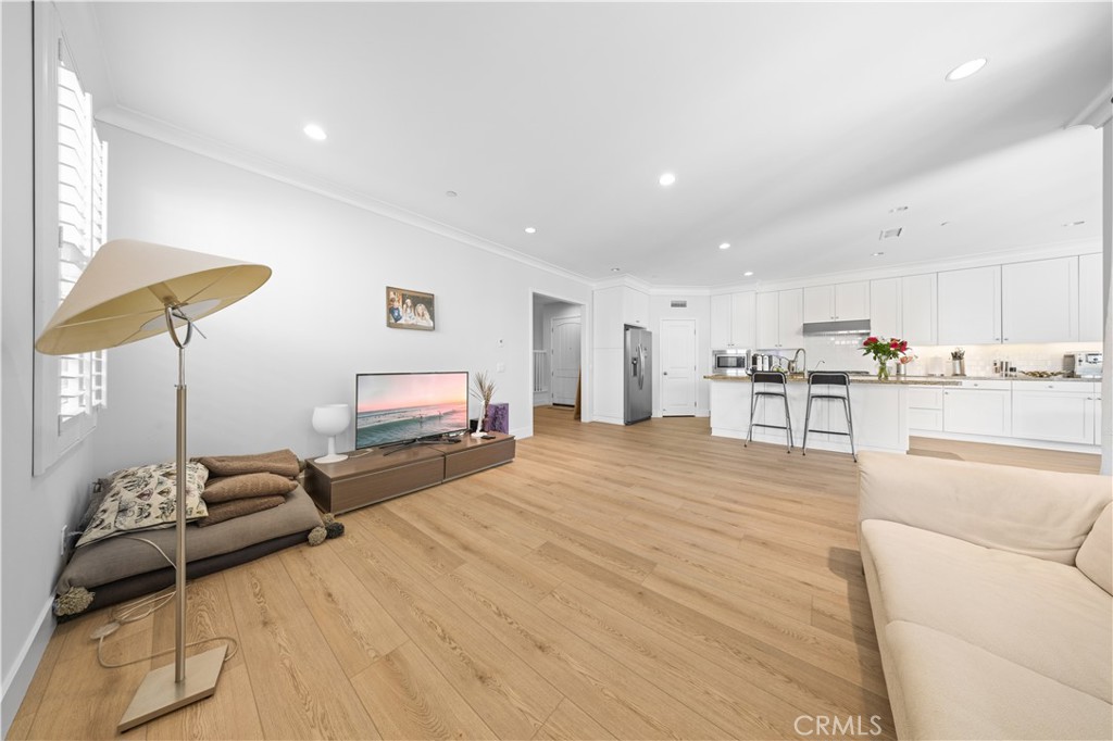 63 Birmingham Irvine, CA 92620 - Photo 11 of 28 a bed room with a bed and a chair