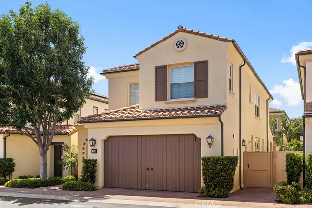 a front view of a house with a garage