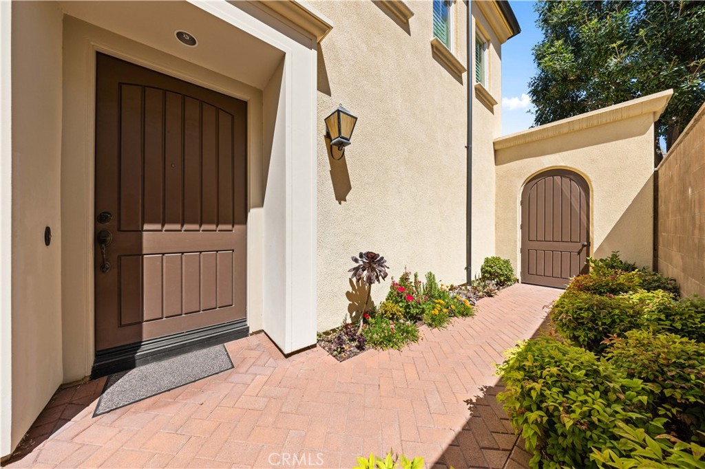 63 Birmingham Irvine, CA 92620 - Photo 3 of 28 a front view of a house with a yard