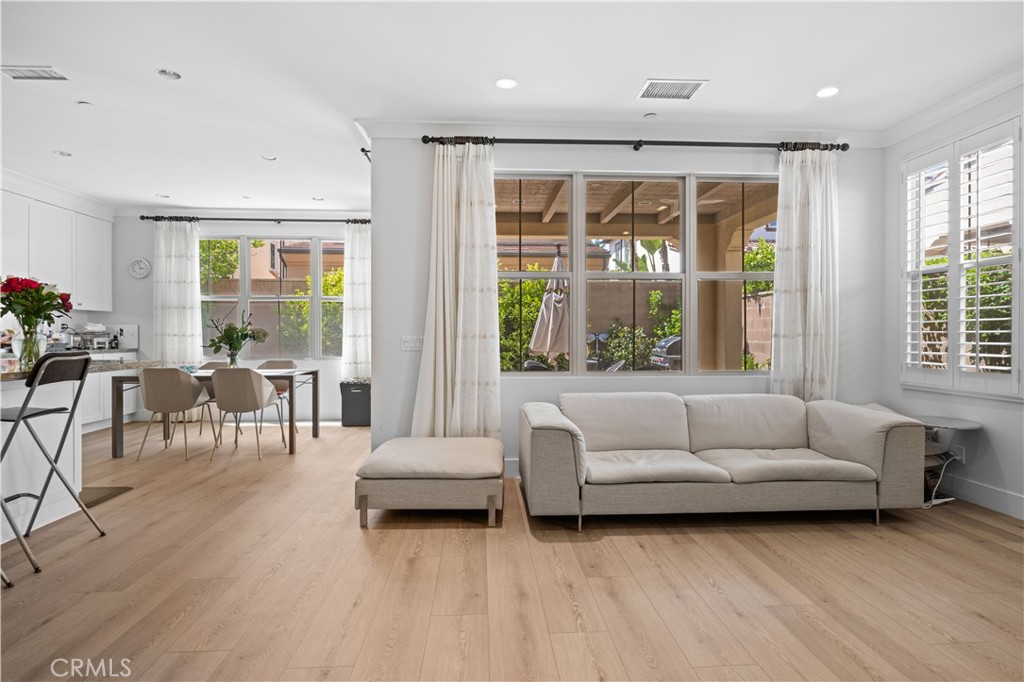 63 Birmingham Irvine, CA 92620 - Photo 6 of 28 a living room with furniture and a large window