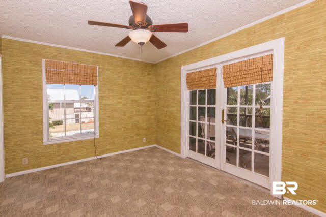 26490 Marina Road Orange Beach, AL 36561 - Photo 13 of 25 Has french doors leading to HUGE screened in porch upstairs.