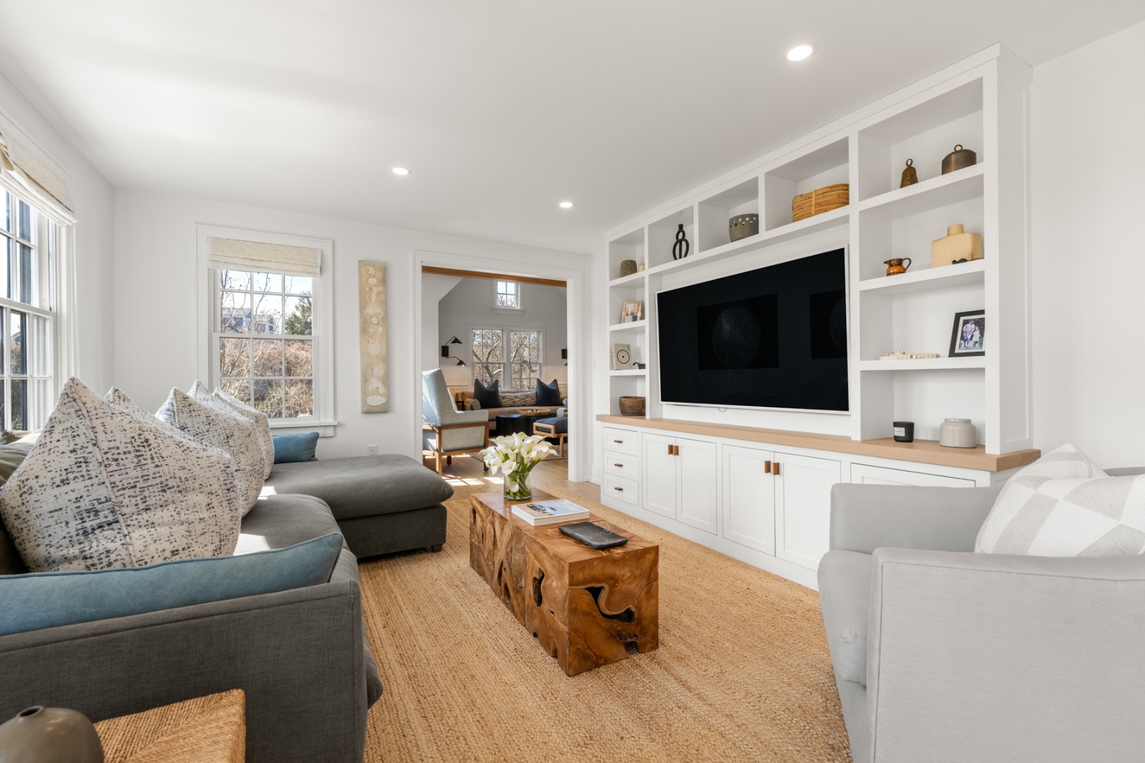 174 Cliff Road Nantucket, MA 02554 - Photo 8 of 49 a living room with furniture and a flat screen tv