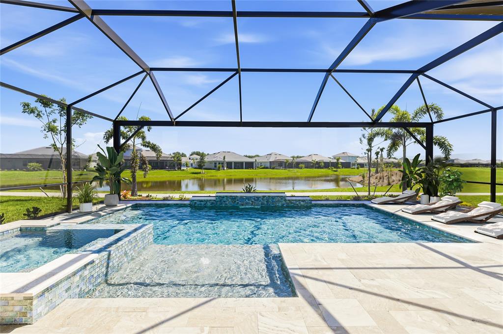 19156 Cherrystone Way Lakewood Ranch, FL 34211 - Photo 36 of 49 a view of a swimming pool with a yard