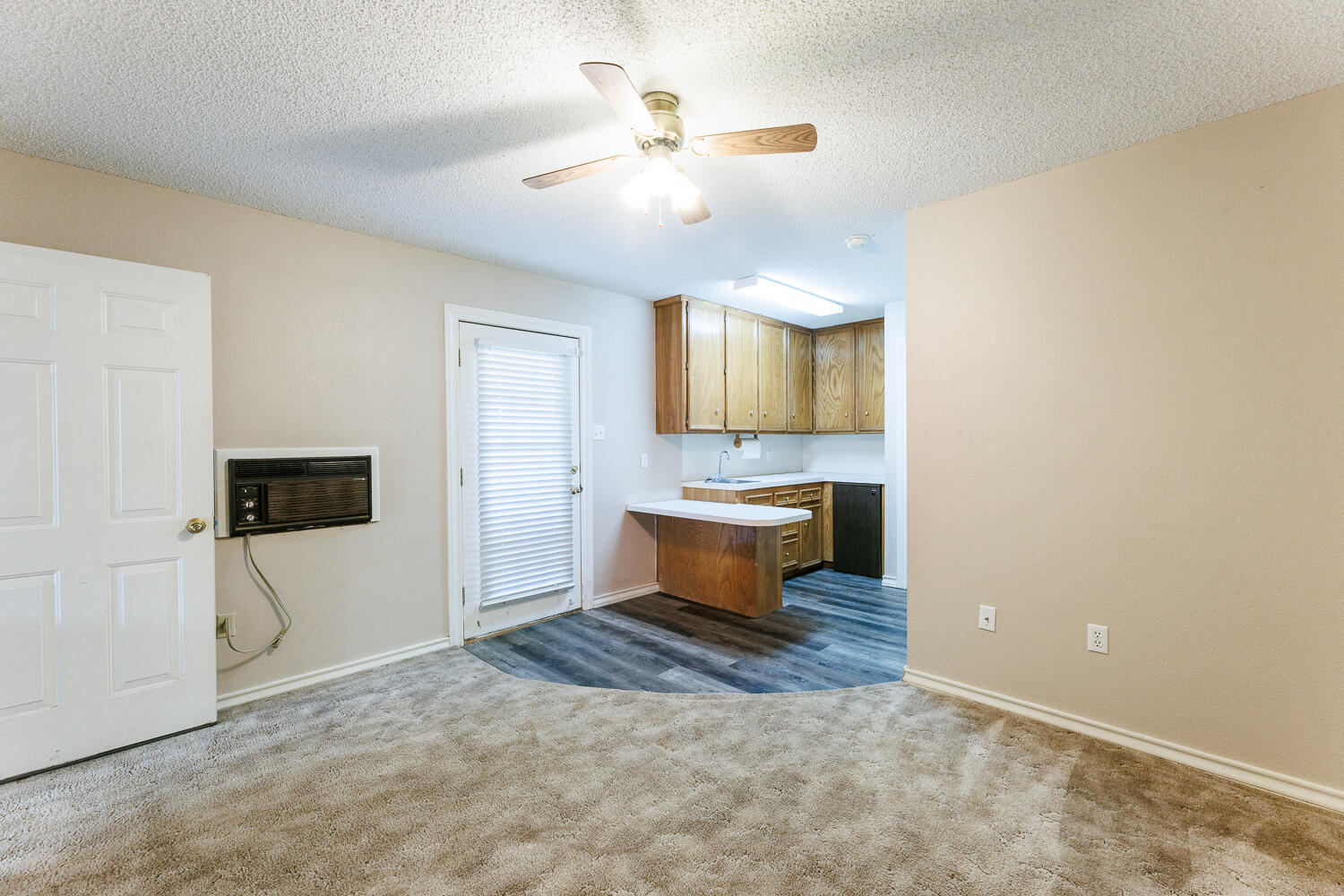 206 Collins Avenue Sundown, TX 79372 - Photo 64 of 82 a living room with furniture and a flat screen tv