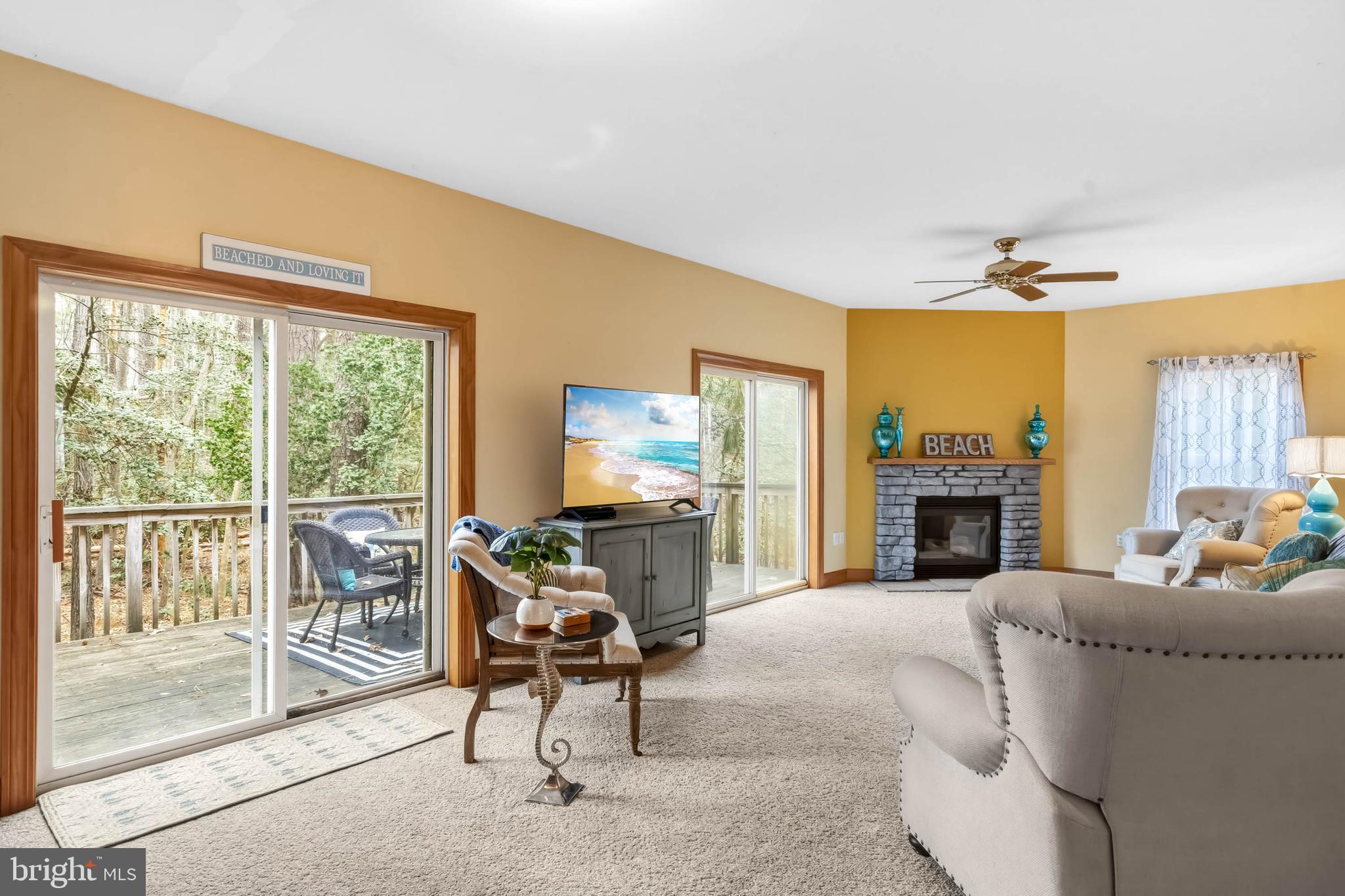 34521 Bookhammer Landing Road Lewes, DE 19958 - Photo 5 of 43 Ample light in living space from back porch
