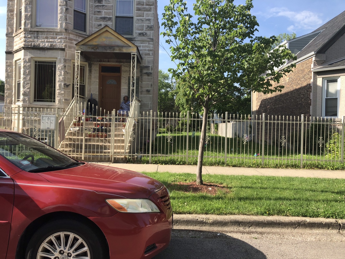 3909 West Fillmore Street Chicago, IL 60624 - Photo 4 of 4 a front view of a house with a yard