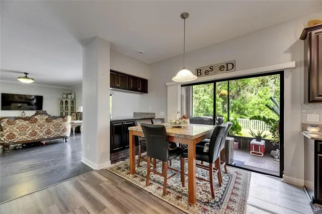 a room with furniture and a potted plant