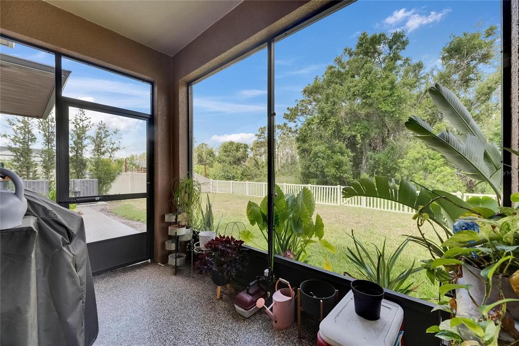 5057 Ivory Stone Drive Wimauma, FL 33598 - Photo 14 of 46 a room with furniture and a potted plant