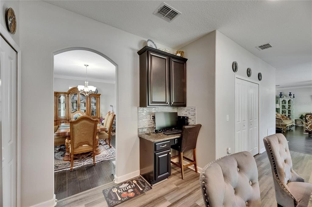 5057 Ivory Stone Drive Wimauma, FL 33598 - Photo 15 of 46 a living room with furniture and a mirror