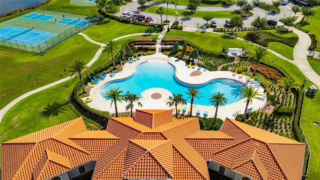 5057 Ivory Stone Drive Wimauma, FL 33598 - Photo 46 of 46 an aerial view of a house with a swimming pool patio and outdoor seating