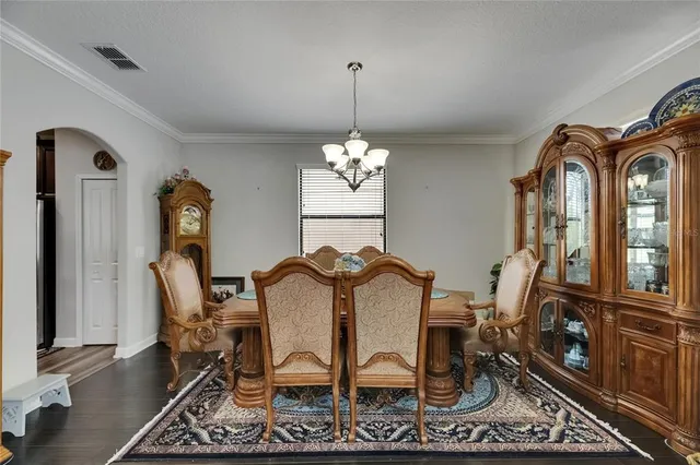 a view of a living room and dining room