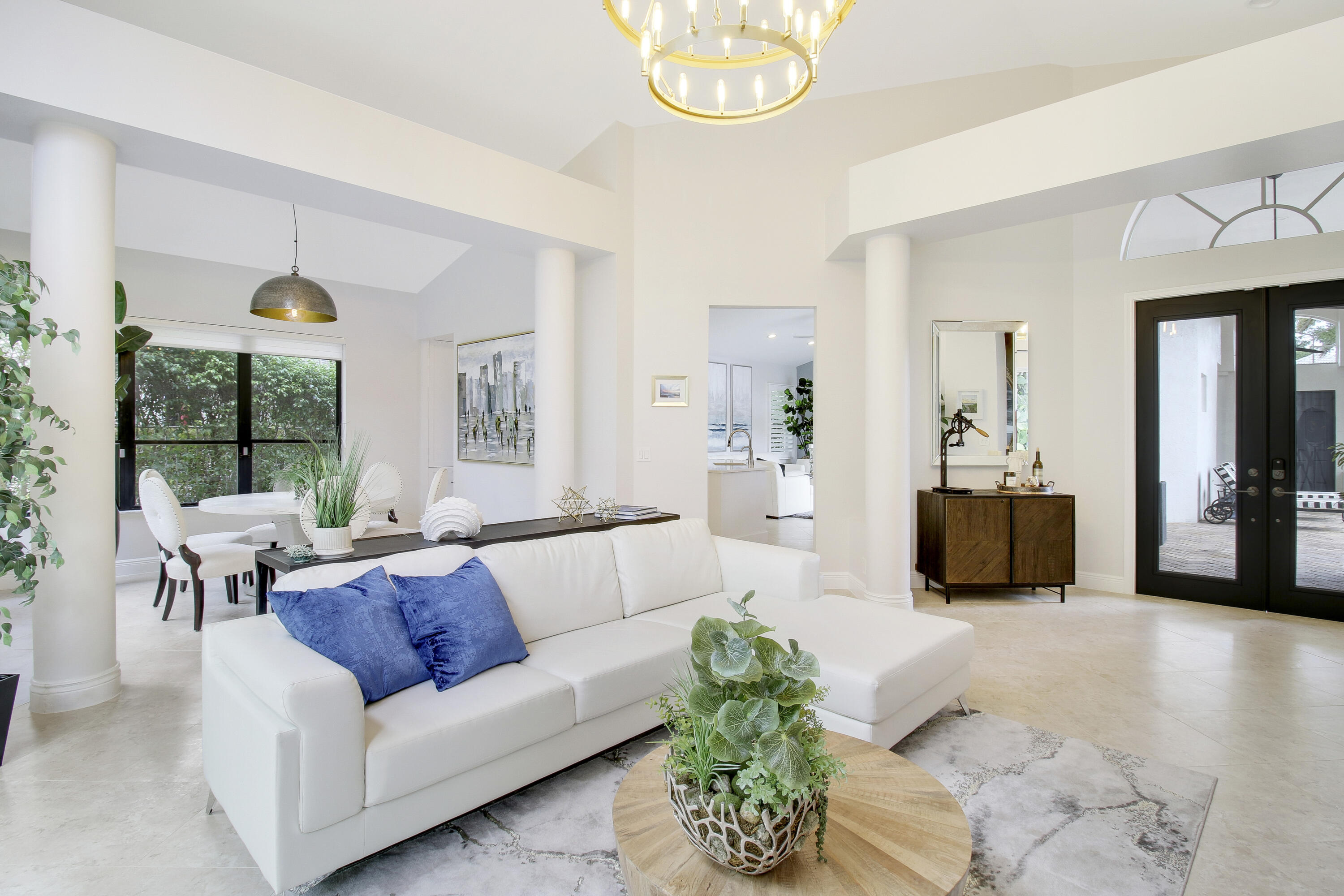 7606 La Corniche Circle Boca Raton, FL 33433 - Photo 15 of 49 a living room with furniture and a large window