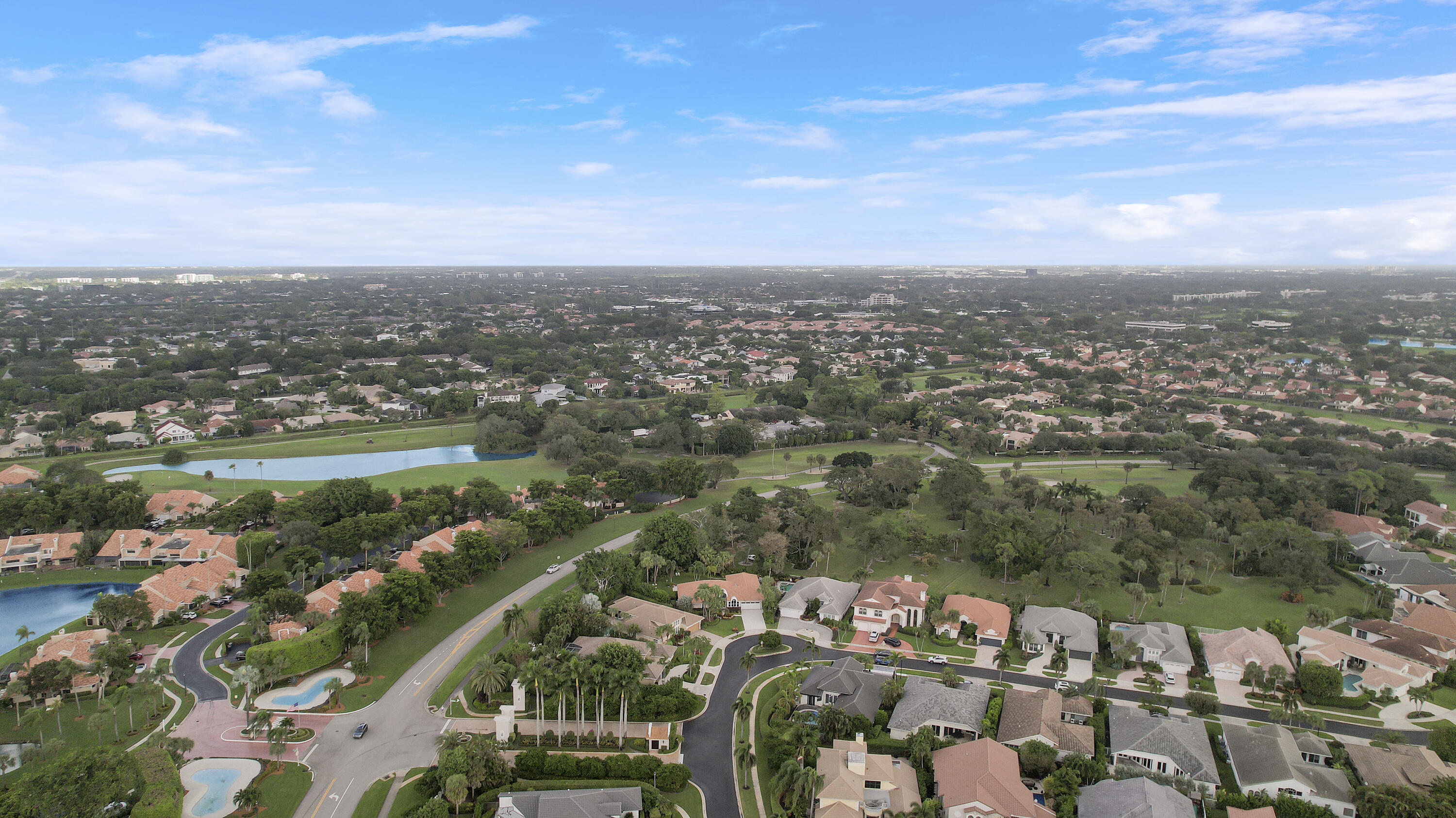 7606 La Corniche Circle Boca Raton, FL 33433 - Photo 49 of 49 an aerial view of a city with lots of residential buildings