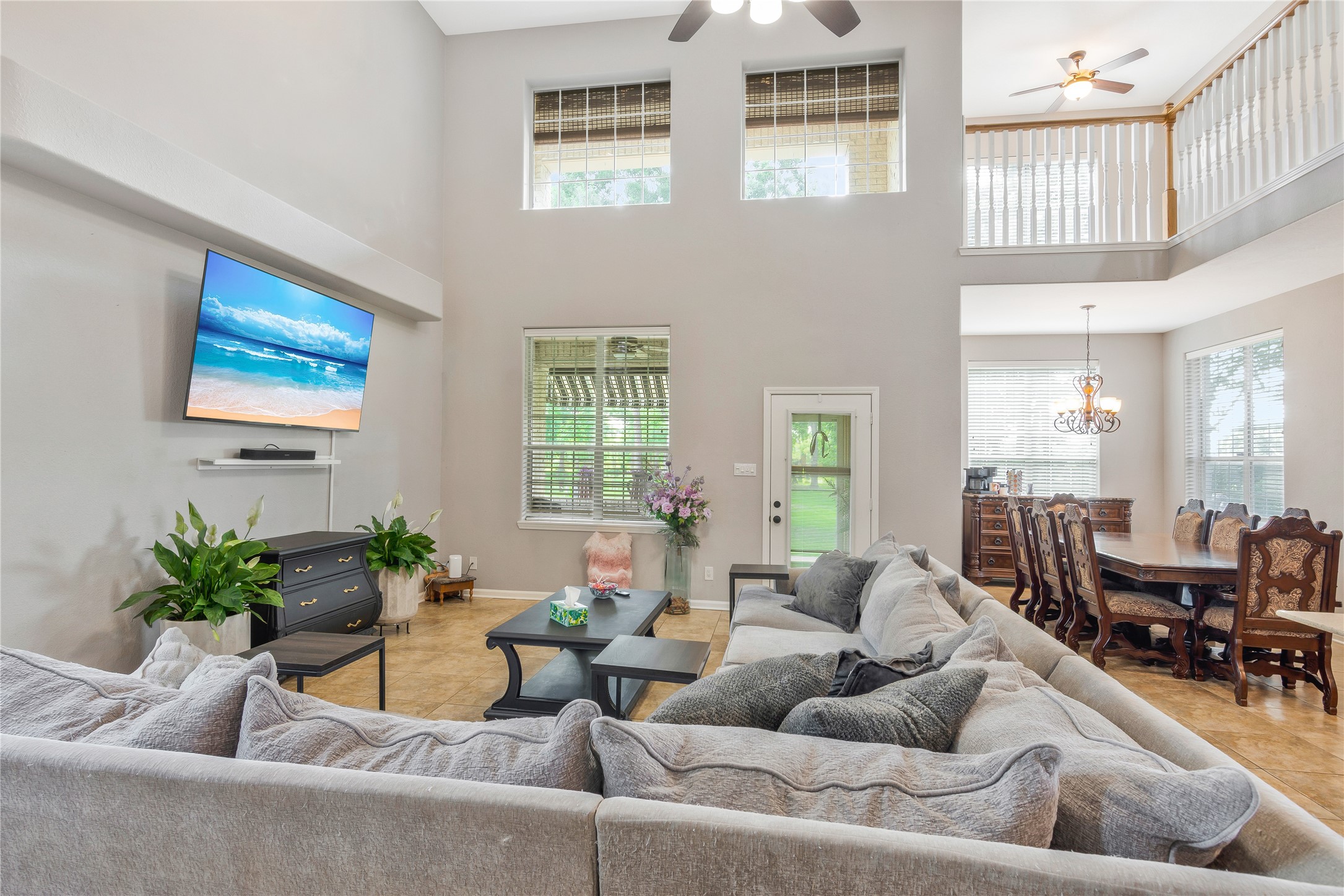13914 Skinner Road Cypress, TX 77429 - Photo 27 of 50 Mother In Law Suite: Spacious living area with high ceilings, large windows, and plenty of natural light.