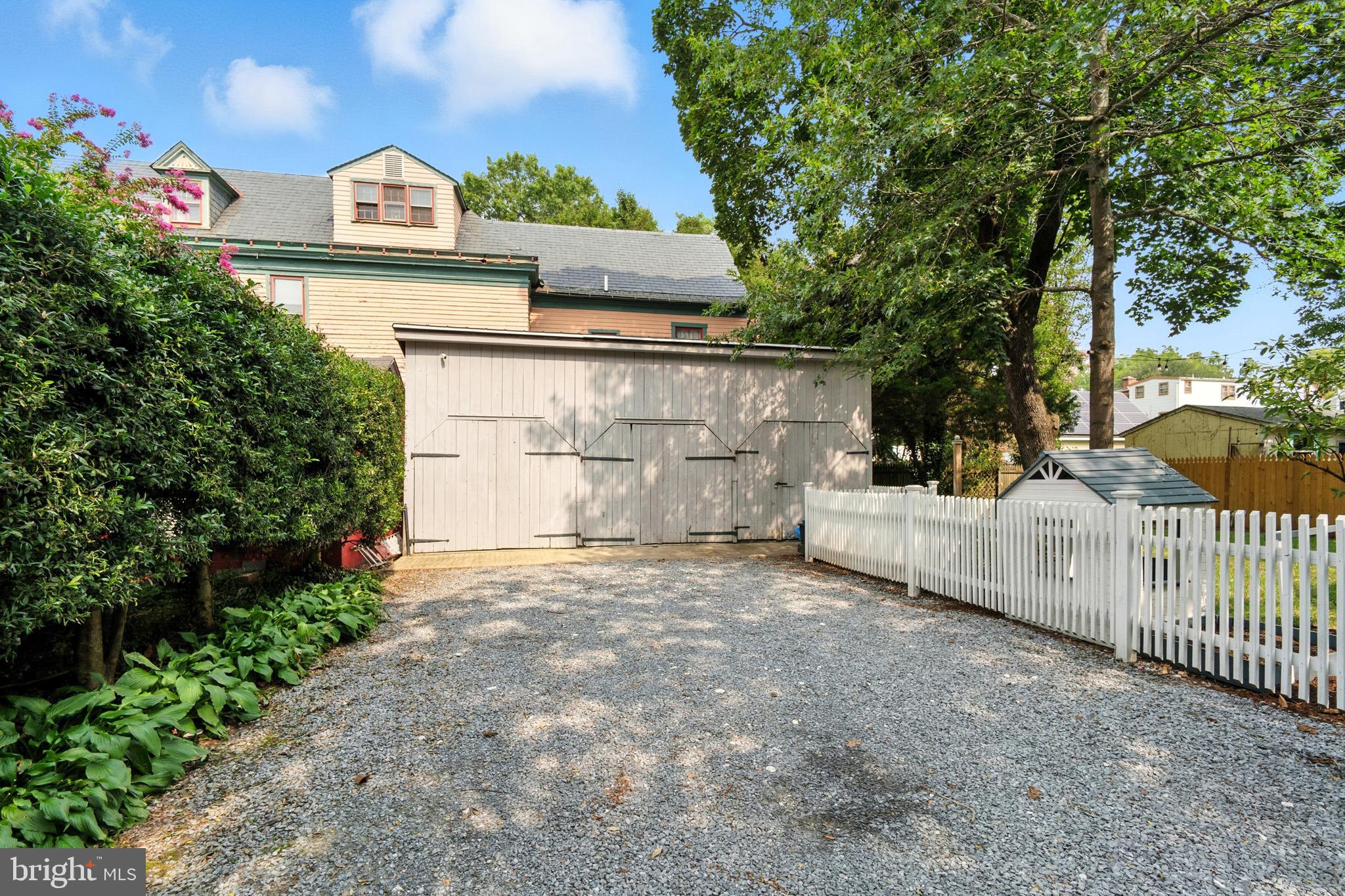 110 South Mill Street Chestertown, MD 21620 - Photo 33 of 39 a view of a entrance gate of the house and trees